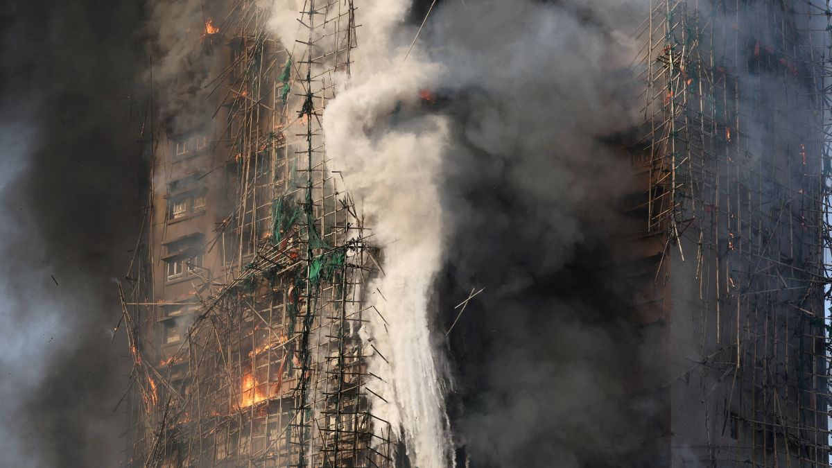Flames swept through bamboo scaffolding spanning several buildings at the Wang Fuk Court housing estate in Tai Po, Hong Kong, on November 26. (Reuters) Flames swept through bamboo scaffolding spanning several buildings at the Wang Fuk Court housing estate in Tai Po, Hong Kong, on November 26. (Reuters)