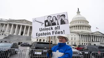 A protester holds a placard demanding the release of the Epstein files at the US Capitol. File image/AFP