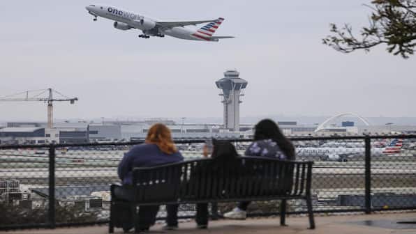 Major airlines suspend Middle East flights as tensions rise after Trump’s ‘armada’ warning