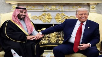 Saudi Crown Prince Mohammed bin Salman holds US President Donald Trump's hand during a meeting in the Oval Office at the White House in Washington. November 19, 2025,  Reuters