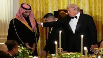 US President Donald Trump and Saudi Arabia's Crown Prince Mohammed bin Salman are seated for a dinner in the East Room of the White House. AP