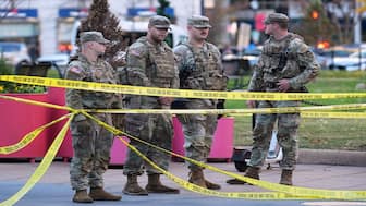 National Guard are seen after reports of two National Guard soldiers shot near the White House in Washington, Wednesday. AP