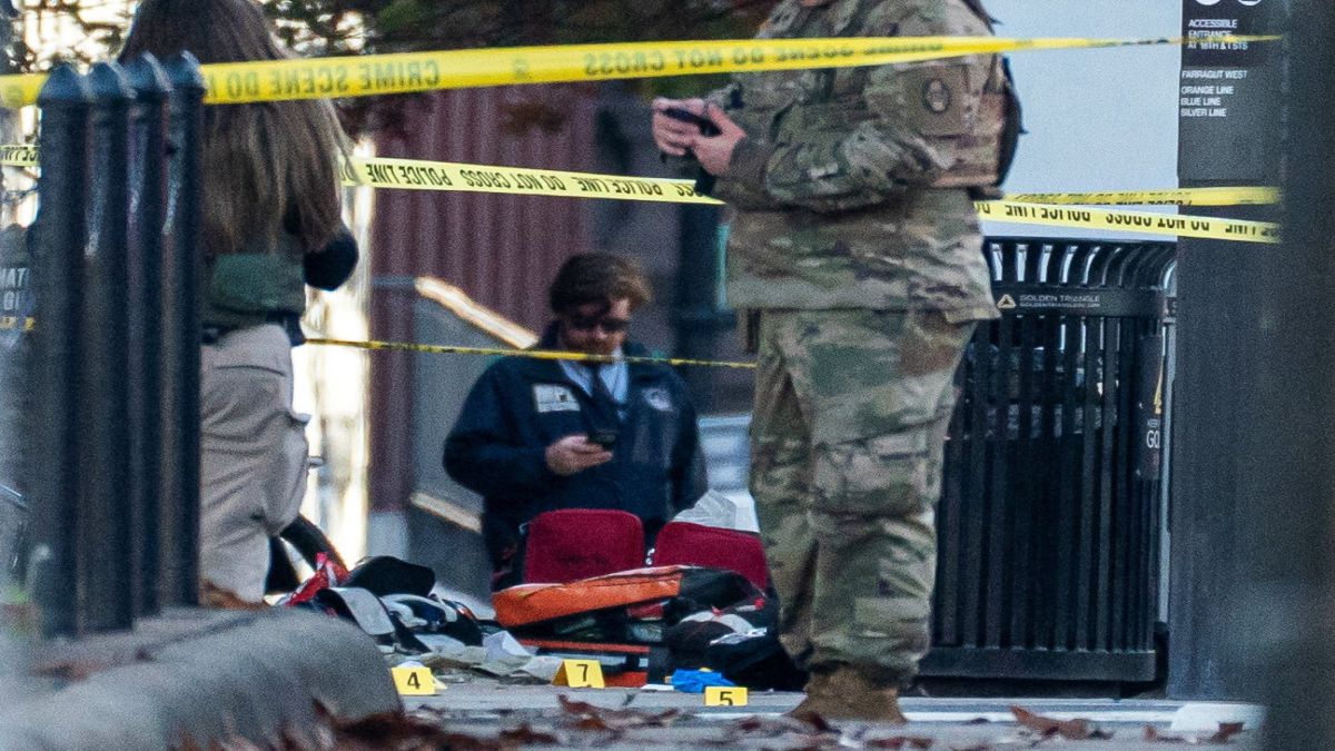 Evidence markers sit on the ground after two National Guard members were shot near the White House in Washington, DC. Reuters Evidence markers sit on the ground after two National Guard members were shot near the White House in Washington, DC. Reuters