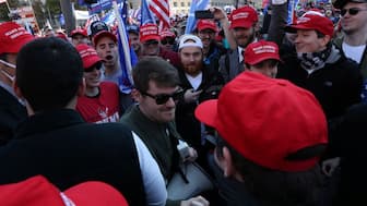 Supporters of the America First ideology and U.S. President Donald Trump cheer on Nick Fuentes, a leader of the America First movement and a white nationalist. Reuters