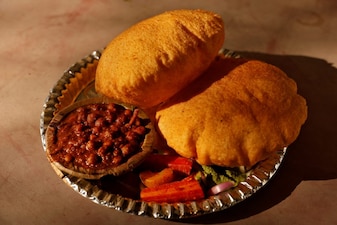 A view shows Chole Bhature at a food stall in New Delhi. Reuters