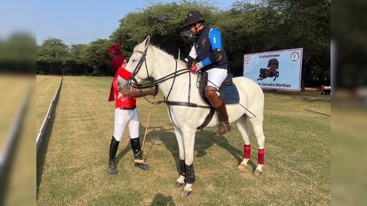 Representing the Bodyguard team, Colonel Amit Berwal, commandant of the President’s Bodyguard, mounts PBG horse, Amigo, ahead of the President’s Polo Cup held at the President’s Bodyguard Parade Ground in New Delhi, November 29, 2025. Firstpost/Anmol Singla