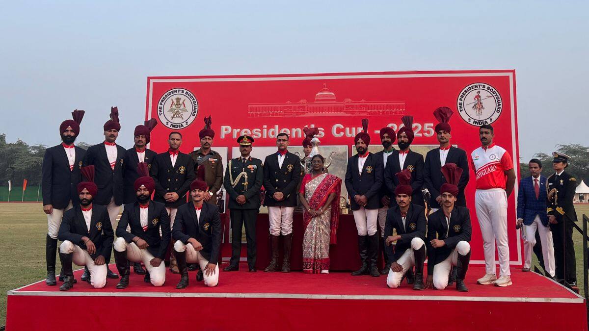 The team behind the President’s Polo Cup poses for a photo with President Droupadi Murmu at the President’s Bodyguard Parade Ground in New Delhi, November 29, 2025. Firstpost/Anmol Singla