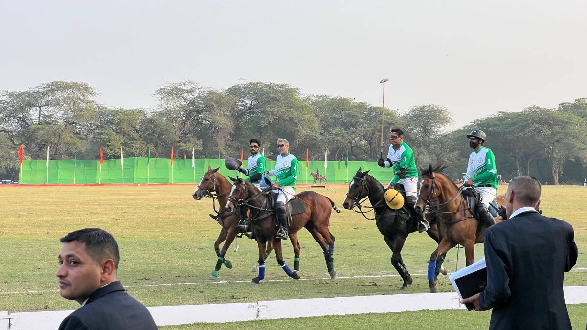 Representing the Lancers team (L to R) Sidhhant Sharma, Angad Kalaan, Captain AP Singh and Daffadar Sukhjeet Singh take a lap after the President’s Polo Cup held at the President’s Bodyguard Parade Ground in New Delhi, November 29, 2025. Firstpost/Anmol Singla