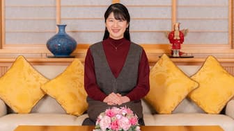 This handout photo taken on November 7, 2025 and released by the Imperial Household Agency of Japan shows Princess Aiko, the daughter of Japan's Emperor Naruhito and Empress Masako, posing for a photo at the Imperial Palace in Tokyo, ahead of her 24th birthday on December 1, 2025. (AFP)