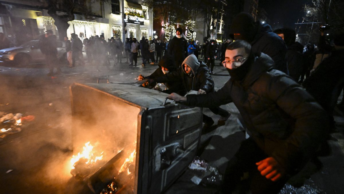 Protesters burn trash cans during an anti-government protest in Sofia on December 1, 2025. Tens of thousands of people held anti-government protests in Bulgaria on Monday, widening an anti-corruption movement sweeping the European Union's poorest country as it prepares to adopt the euro. (Photo by Nikolay DOYCHINOV / AFP) Protesters burn trash cans during an anti-government protest in Sofia on December 1, 2025. Tens of thousands of people held anti-government protests in Bulgaria on Monday, widening an anti-corruption movement sweeping the European Union's poorest country as it prepares to adopt the euro. (Photo by Nikolay DOYCHINOV / AFP)