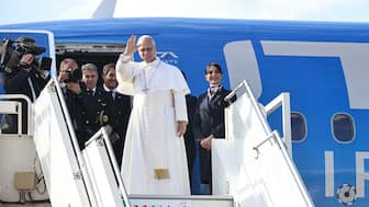 Pope Leo XIV waves upon departing Beirut International Airport on December 2, 2025. (AFP)