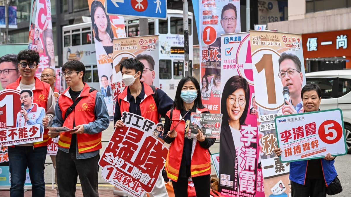 Hong Kong holds ‘patriots only’ vote amid public outrage over deadly fire