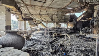 A burned-out interior is seen inside the Birch nightclub following a fire that broke out last midnight, in Goa on December 7, 2025. (AFP)