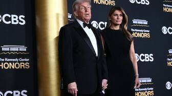 US President Donald Trump and First Lady Melania Trump arrive for the 48th Kennedy Center Honors gala at the Kennedy Center in Washington, DC, on December 7, 2025. (Photo by Brendan SMIALOWSKI / AFP)