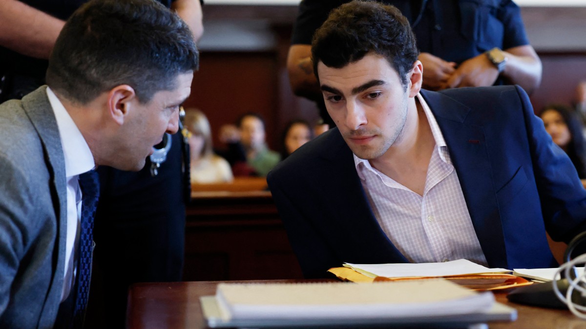 Luigi Mangione (R) appears in Manhattan Supreme Court for a pretrial evidence hearing in the murder case of UnitedHealthcare CEO Brian Thompson, in New York, on December 9, 2025. AFP Luigi Mangione (R) appears in Manhattan Supreme Court for a pretrial evidence hearing in the murder case of UnitedHealthcare CEO Brian Thompson, in New York, on December 9, 2025. AFP