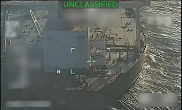 This screen grab from a video posted by US Attorney General Pam Bondi on her X account on December 10, 2025 shows what Bondi says is the execution of "a seizure warrant for a crude oil tanker used to transport sanctioned oil from Venezuela and Iran" off the coast of Venezuela on December 10. The United States has seized a large oil tanker off the coast of Venezuela, President Donald Trump said on December 10, dramatically escalating tensions between Washington and Caracas. (Photo by Handout / US Attorney General Pam Bondi's X account / AFP) 