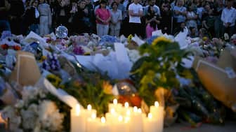 Mourners gather at a tribute at the Bondi Pavillion in memory of the victims of a shooting at Bondi Beach, in Sydney on December 15, 2025. (AFP)
