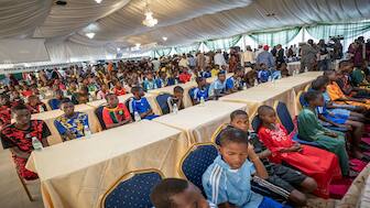 Freed school children are seen during a reception at the Governor's office in Minna on December 8, 2025. AFP