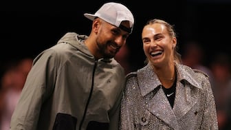 Aryna Sabalenka and Nick Kyrgios laugh ahead of their Battle of the Sexes tennis match in Dubai, United Arab Emirates, Sunday Dec. 28, 2025. AP