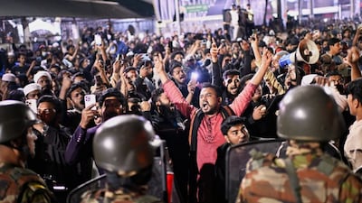 Protesters shout slogans in front of the premises of the 'Prothom Alo' daily newspaper after news reached the country from Singapore of the death of an activist, Sharif Osman Hadi, in Dhaka, Bangladesh, December 19, 2025. File Image/Reuters
