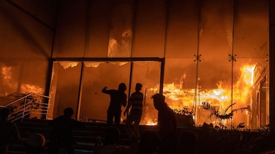A mob sets fire to The Daily Star newspaper office building in Dhaka, Bangladesh, on December 19, 2025. (Photo: Abdul Goni/Reuters) 