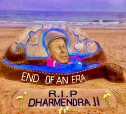 Sand artist Sudarsan Pattnaik creates a sand sculpture to pay tribute to veteran actor Dharmendra, who passed away, at Puri beach, Odisha. File image/PTI