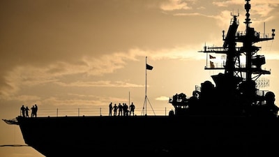 The Wasp-class amphibious assault ship USS Iwo Jima (LHD7) is docked at Rafael Cordero Santiago Port of the America on December 16, 2025 in Ponce, Puerto Rico.- AFP