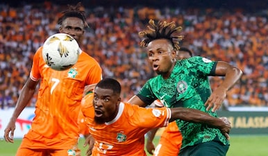 Nigeria striker Samuel Chukwueze (R) said AFCON is one of the best competitions in the world. Image: Reuters