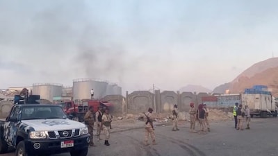 Damaged military vehicles, reportedly sent by the United Arab Emirates to support Southern Transitional Council (STC) separatist forces, following an air strike carried out by the Saudi-led coalition in the port of Mukalla, southern Yemen, on December 30, 2025. (Reuters) 