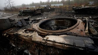 A view of destroyed Russian tanks and armoured vehicles in Dmytrivka village, west of Kyiv, Ukraine, April 1, 2022. REUTERS. 