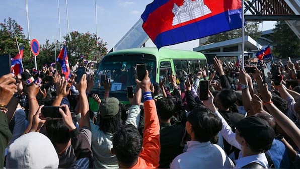 Prisoners go home: Thailand frees 18 Cambodian soldiers captured in July as ceasefire sticks