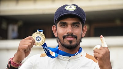 Yash Rathod poses with his Player of the Match award after starring in Vidarbha's victory over Baroda in the 2025-26 Ranji Trophy. PTI