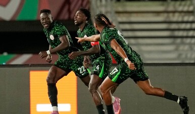 Nigeria's Wilfred Ndidi, center, center, celebrates with teammates after scoring his side's second goal during the Africa Cup of Nations group C soccer match between Nigeria and Tunisia in Fez, Morocco, Saturday, Dec. 27, 2025. AP