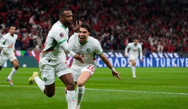 Morocco's Ayoub El Kaabi, left, celebrates with his teammate Neil Yoni El Aynaoui after scoring his side's first goal during the Africa Cup of Nations group A soccer match between Zambia and Morocco in Rabat, Morocco, Sunday, Dec. 28, 2025. AP