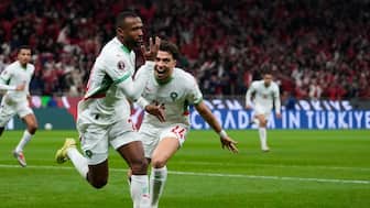 Morocco's Ayoub El Kaabi, left, celebrates with his teammate Neil Yoni El Aynaoui after scoring his side's first goal during the Africa Cup of Nations group A soccer match between Zambia and Morocco in Rabat, Morocco, Sunday, Dec. 28, 2025. AP