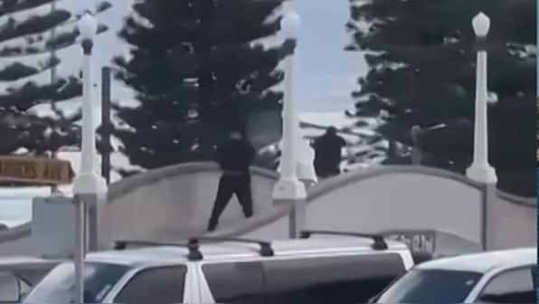 At least 10 killed, 11 injured as two gunmen open fire near Sydney’s Bondi Beach