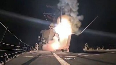 This image, taken from a US Department of Defense video shared on X on December 25, 2025, shows a missile launched from a naval vessel during US strikes in northwestern Nigeria. (AFP)