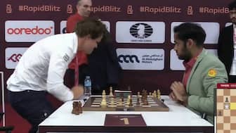 Magnus Carlsen slams the table after losing on time to Arjun Erigaisi. X/Chesscom