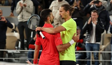 Serbia's Novak Djokovic shakes hands with Germany's Alexander Zverev. Reuters