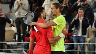 Serbia's Novak Djokovic shakes hands with Germany's Alexander Zverev. Reuters
