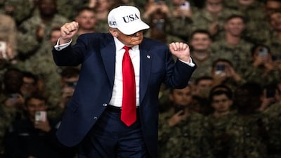 US President Donald Trump dances as he leaves after delivering a speech in front of US Navy personnel on board the US Navy's USS George Washington aircraft carrier at the US naval base in Yokosuka in October. File image/AFP