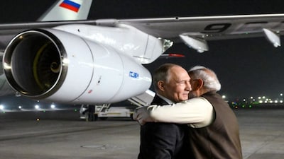Russian President Vladimir Putin welcomed by Prime Minister Narendra Modi upon arrival in New Delhi, December 4. Reuters