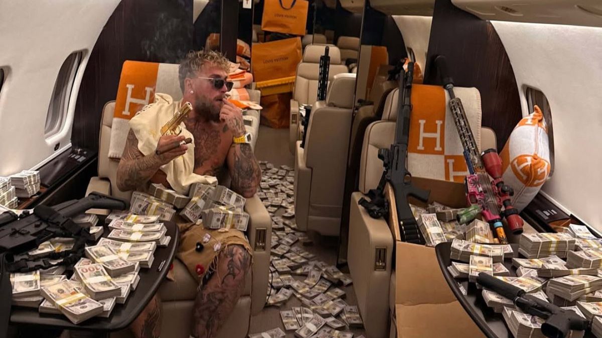 Jake Paul shows off pile of cash and guns as he flies off in private jet after Anthony Joshua defeat Jake Paul shows off pile of cash and guns as he flies off in private jet after Anthony Joshua defeat