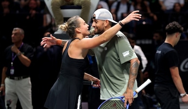 Tennis - 'Battle of the Sexes' - Nick Kyrgios v Aryna Sabalenka - Coca-Cola Arena, Dubai, United Arab Emirates - December 28, 2025 Australia's Nick Kyrgios and Belarus' Aryna Sabalenka after their match. Reuters