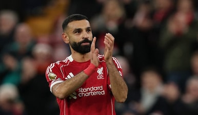 Liverpool's Mohamed Salah applauds fans after Premier League match against Brighton. Reuters