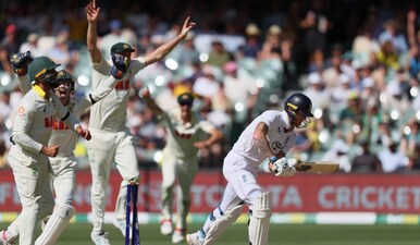 Australian players celebrate after England's Ben Stokes, right, was dismissed during play on day four of the third Ashes cricket test between England and Australia in Adelaide, Australia, Saturday, Dec. 20, 2025. AP