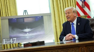 US President Donald Trump delivers remarks, as an image of an F-47 sixth-generation fighter jet is displayed, in the Oval Office at the White House, in Washington, DC, US, March 21, 2025. File Photo/Reuters