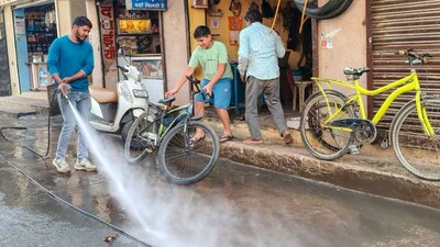 An Indore Municipal Corporation worker during a cleanliness drive after several people were affected due to consumption of contaminated water at Bhagirathpura area, in Indore, Madhya Pradesh, December 31, 2025. PTI