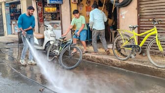An Indore Municipal Corporation worker during a cleanliness drive after several people were affected due to consumption of contaminated water at Bhagirathpura area, in Indore, Madhya Pradesh, December 31, 2025. PTI