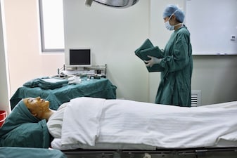 A patient lies down at  plastic surgeon Kim Byung-gun's clinic in Shanghai, who runs South Korea's largest plastic surgery clinic. File photo/REUTERS